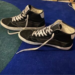 Vans Black and White High-Top Skateboarding Sneakers